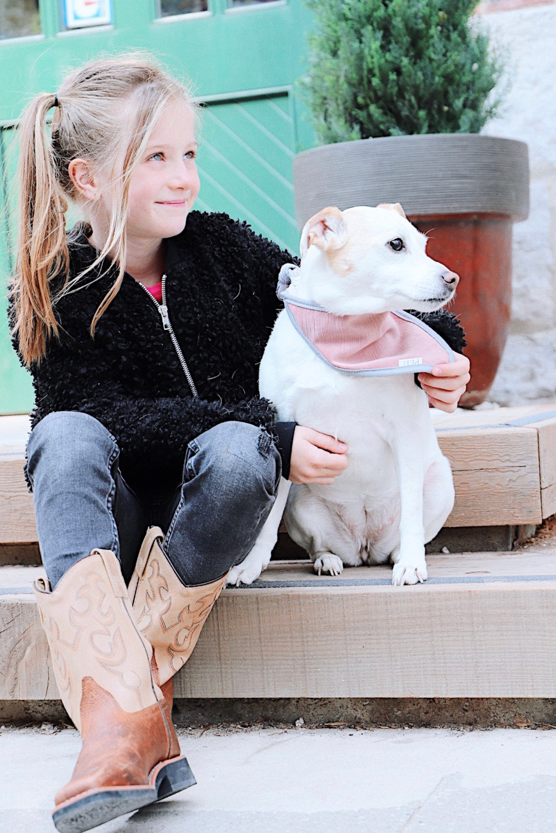 girl and her jack russell dog